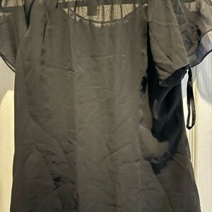 White House Black Market - Black top in size Small. Beaded on the neck.